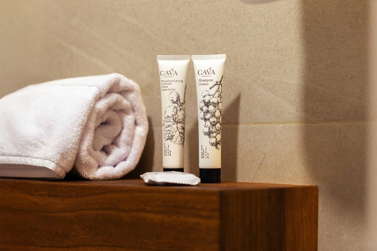 Ancestral Copan Hotel bathroom amenities with modern toiletries and traditional decor.